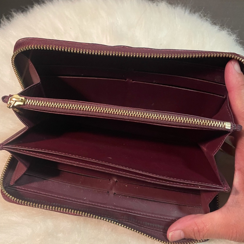 Authentic eggplant purple Louie Vuitton wallet.